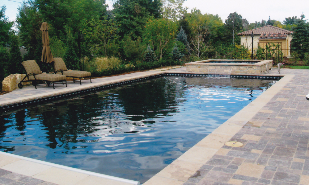 Pool and spa with water feature