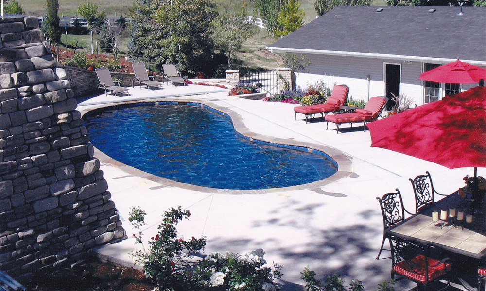 Irregular shaped pool with automatic cover