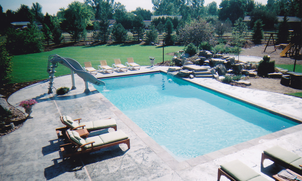 Pool with slide and water feature